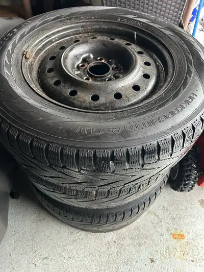 Size: 215 70 16 winter tires Bolt pattern: 5×114.3 Two of the tires have tread remaining Rims are in...