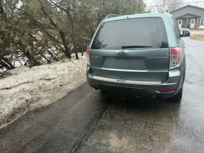 2012 Subaru Forester , runs drives good. Has all power options. Needs breaks and windshield. Drivers...