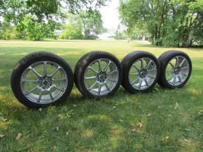 4 SLIGHTLY USED FIREHAWK TIRES 205/50 R17 93V MOUNTED ON ENKEI CUSTOM RIMS ACCOMMODATES EITHER BOLT...