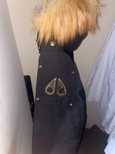 Large black and gold moose knuckle jacket I bought years ago in store and I’m looking to sell becaus...