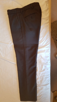 TWO PAIRS OF DRESS PANTS WAIST 30 & 31.