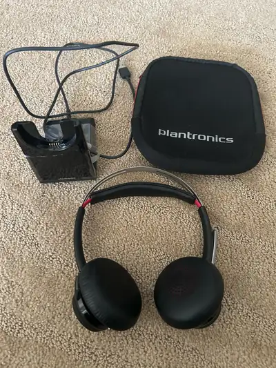Selling a basically new condition pair of Poly/Plantronics Voyager Focus premium wireless/bluetooth...