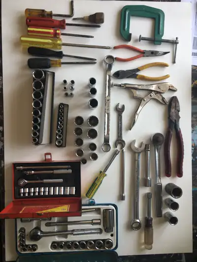Tons of various tools... all used but in good shape. -Chrome-Vanadium ratchet with extender and 3 la...