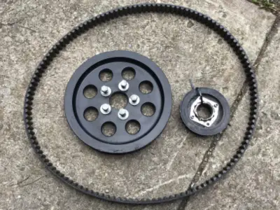 SPORTSTER REAR DRIVE, FRONT AND REAR SPROCKETS, AND BELT, GOOD CONDITION, $100.00, TEXT 416-254-4988