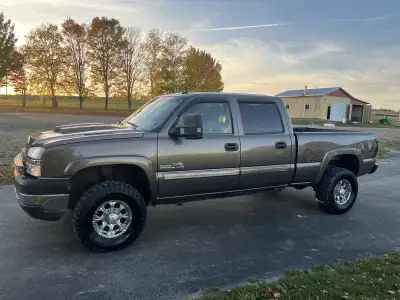 2004 LLY duramax! 4 inch MBRP exhaust and a bully dog 4 stage chip 3.5 rough country lift truck is w...