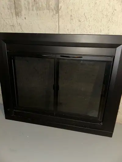 Black fireplace fascia - newer condition. Only used a few times then we decided to change our firepl...