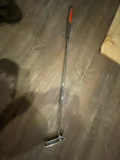  A Nike putter , View more