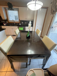 Brown dining table W 4 white chairs