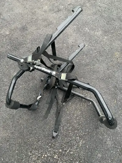 three bicycle carrier,excellent condition,call 902-680-5418
