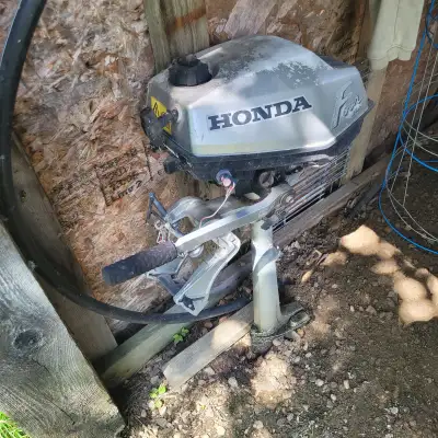 2HP honda used for back up on 24 foot pontoon boat has maybe 500 hours on it run good not ran for 3...