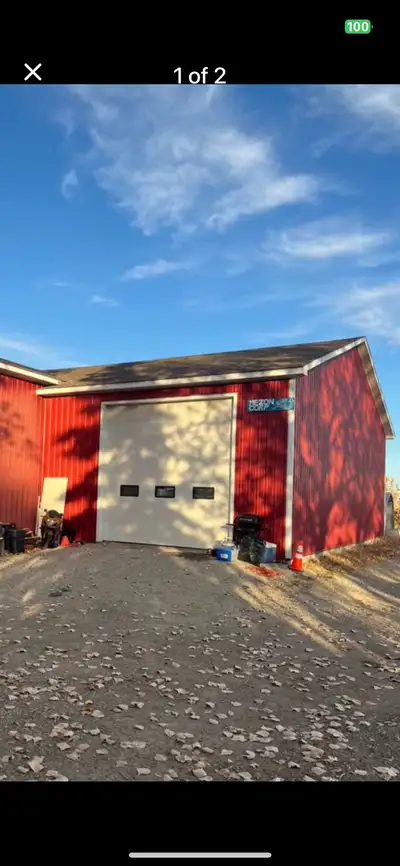 1400 square-foot shop heated with power and water 10 minutes east of Chestermere 14 foot Overhead Do...