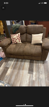Brown reclining couch & love seat