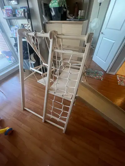 This Montessori climbing structure is perfect for active kids! In good used condition, it has provid...