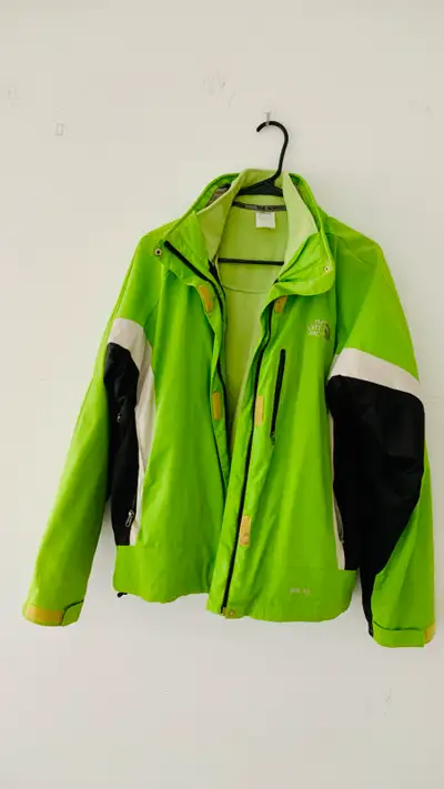 Stay warm and stylish with this The North Face lime green ski jacket, perfect for hitting the slopes...