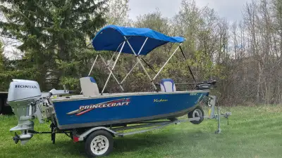 2002 Princecraft Ykon aluminum boat c/w like new 25hp Honda four stroke outbord &galvanized trailer....