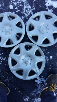 14" Yokohoma snow tires/mazda hubcaps