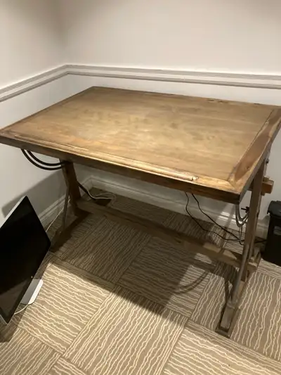This is a used drafting-style desk/table that offers a unique and versatile workspace. It's perfect...