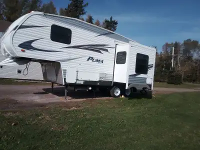2010 Puma 5th wheel couples, full shower, queen bed, separate toilet room, outdoor speakers, winteri...