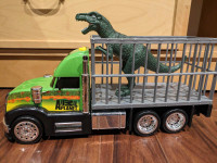 Camion et dinosaure