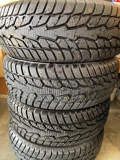 Set of 4 Winterquest studded tires 235/60/R17 with 98% treads in excellent condition.