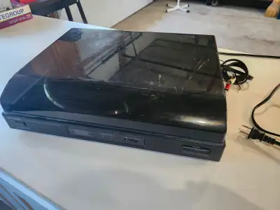 Belt drive. Stylus in mint shape. 33 and 45 speeds. One lid hinge spring broke so lid doesn't stay o...