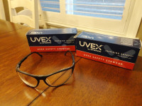 Two Uvex Brand New Black Frame Clear Lens Safety Glasses
