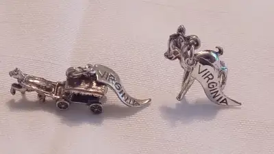 A PAIR OF 925 STERLING SILVER BRACELET CHARM pieces ONE IS A BAMBY AND A HORSE CARRIAGE THE BOTH WEI...