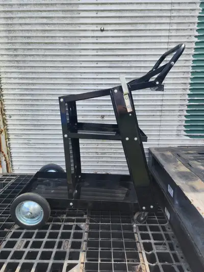 For sale a used fully assembled, POWERFIST MIG/Arc Welder Cart 3 Levels On Wheels. SKU: 8069213 Firs...