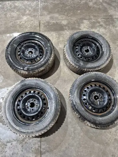 225/65R17 Altimax Arctic tires 17x6.5ET 5x120 hole radius Approximately 70% tread left and all wheel...