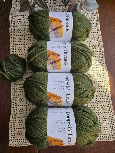 Loops & Threads Charisma Yarn in forest green shade. These are bulky weight skeins of 100% acrylic y...
