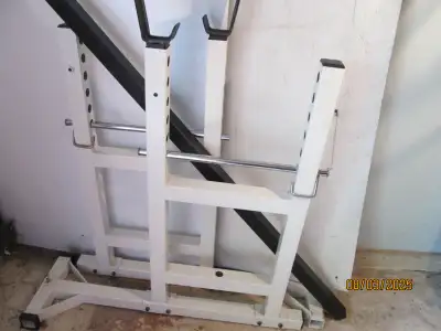 Squat rack with safety bars., View more