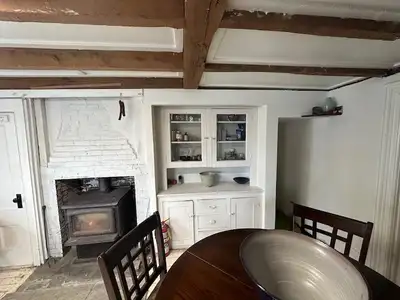 Large living room, private grade level entrance, original summer kitchen/fireplace, dishwasher, in s...