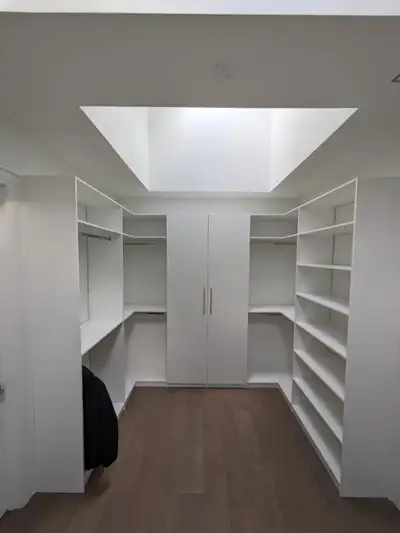 1. Durable Construction: We utilize 5/8-inch white Melamine in crafting our custom closets. This rel...