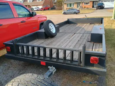 Utility trailer, easily holds 3 quads, can be loaded from the back and the passenger side. 200in lon...
