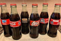 Collectors Coke Bottles in original carton
