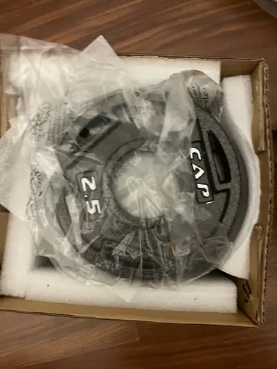 2.5 lb plates, set of six CAP Barbell 2-inch Olympic Grip Weight Plate, 2.5 lb, set of 6, black Purc...