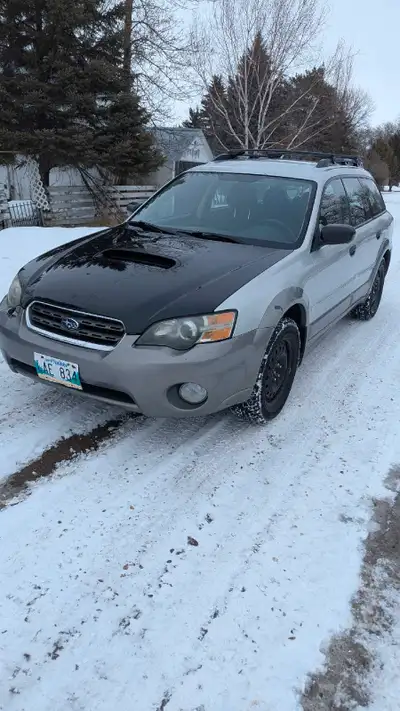 This is an AWD Subaru Outback Wagon so there's lots and lots of trunk space. It has had the headgask...
