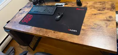 Selling two spacious wooden desks, perfect for computer setups, studying, or home office. They have...