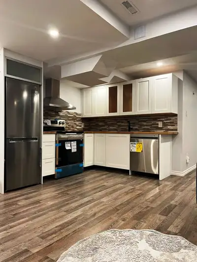 This bright, renovated 2-bedroom basement apartment offers a modern and functional open-concept layo...