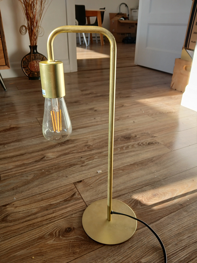 Lampe de table couleur laiton., View more