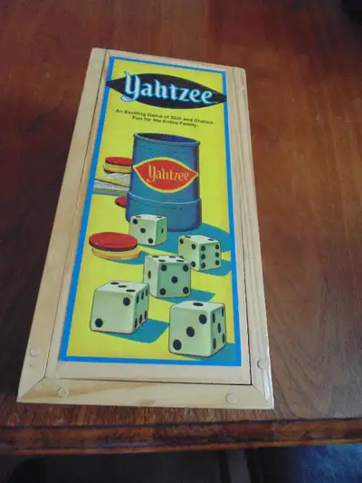 Very rare 2004 Yahtzee in Wooden Box. Pre-owned. Complete.