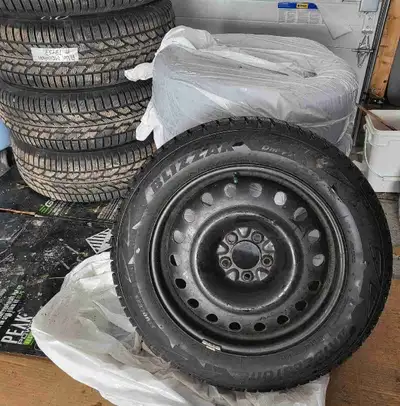 Set of 4 Blizzak Winter Tires on rims. Non studded. Size 225/60R/18 Used only 2 seasons. Sold vehicl...