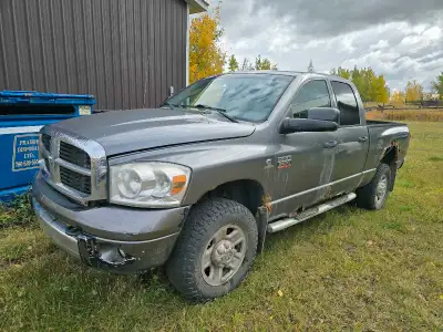 2007 5.9 Cummins Diesel Ram Quad Cab 4x4 for sale. Time to put old Rusty out to pasture. She don't l...