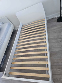 Ikea white twin size bed frame as shown