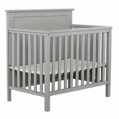 Dream On Me convertible Mini Crib the Ava model 635 in Pebble Grey is designed to grow with your chi...