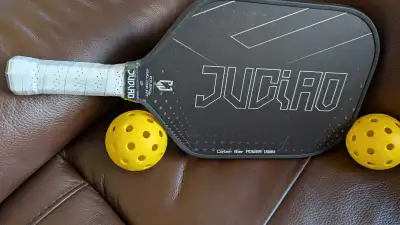 New never used pickleball racket and balls.