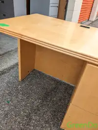Small maple desk with drawers.