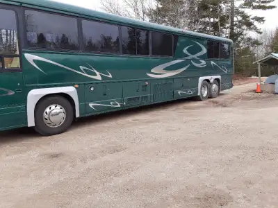 1994 MCI dl3 Detroit 60 series, 264,000 miles. 45 foot, 102" wide, tag axle highway coach. We have t...