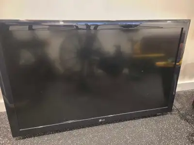 LG TV with wall mount. No base No remote TV works