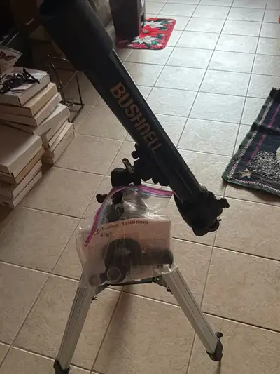 Explore the cosmos with this used Bushnell telescope, perfect for budding astronomers. It comes with...